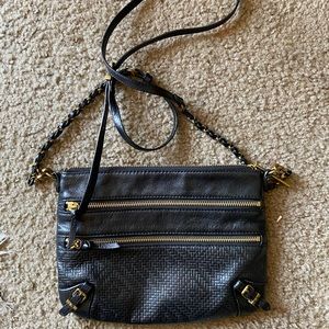 Small black and gold cross body